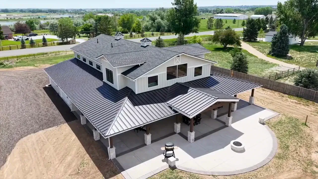 Aerial view of a completed Rudkin custom home on an open lot outside Fort Collins, Colorado