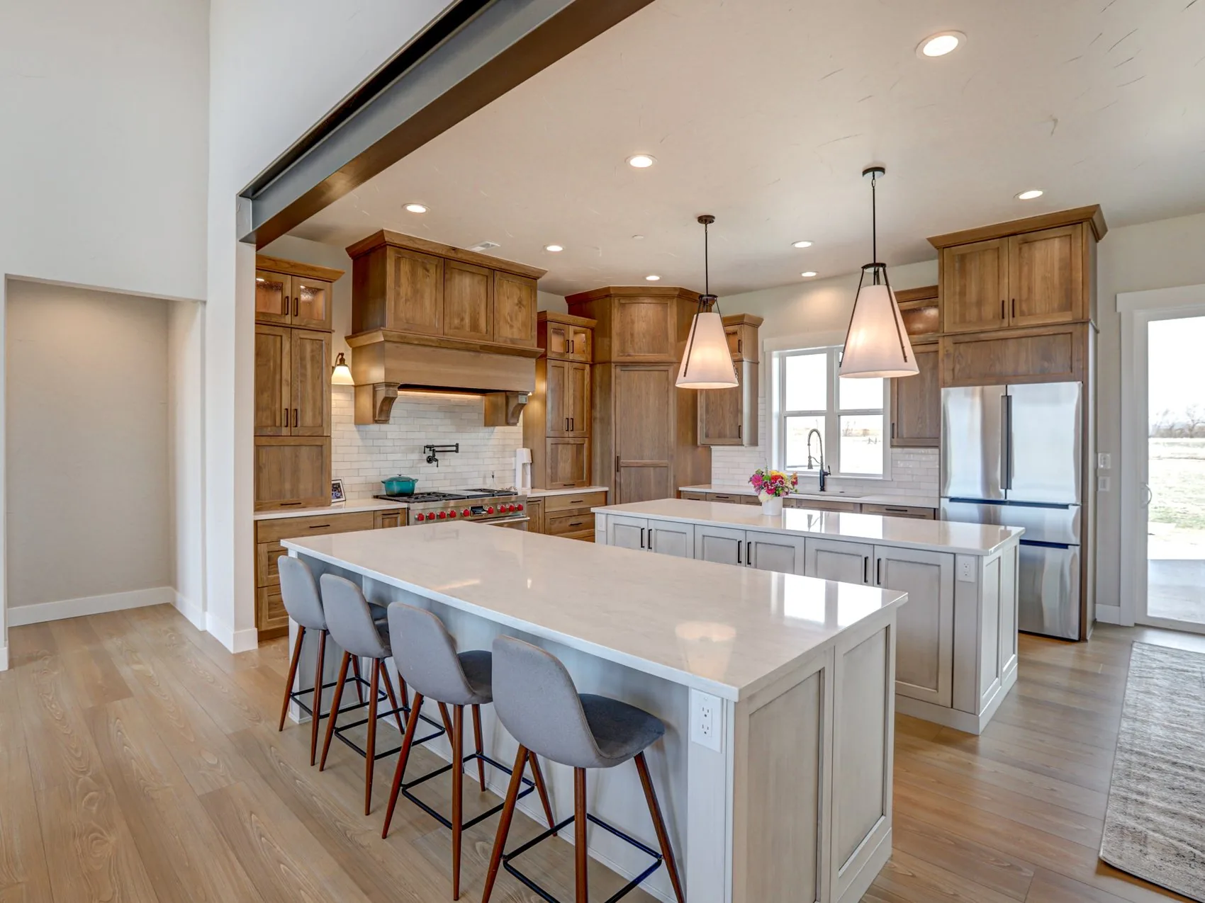Open kitchen with wood cabinetry in a Rudkin remodel