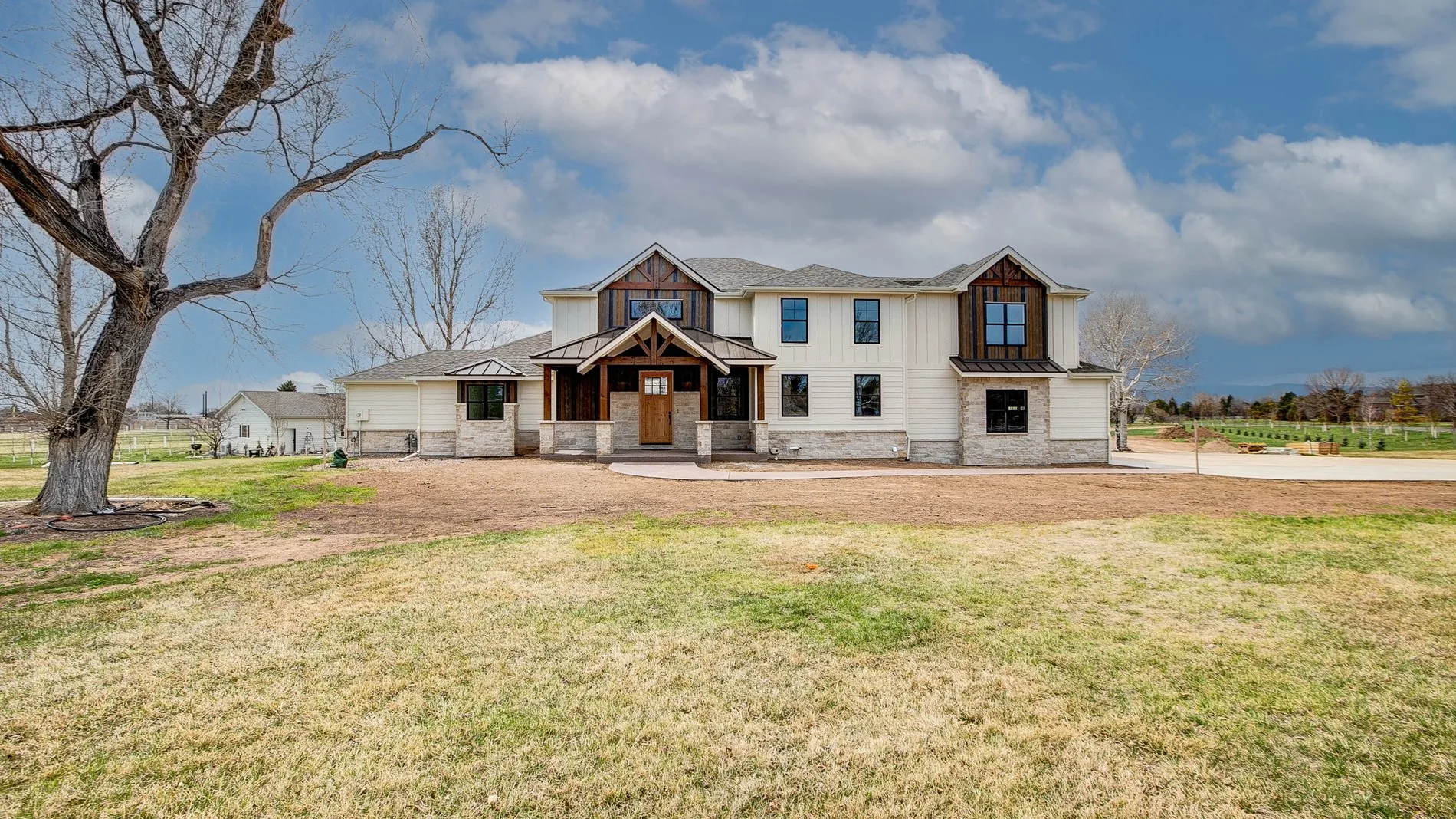 A two story custom home built by Rudkin on open acreage